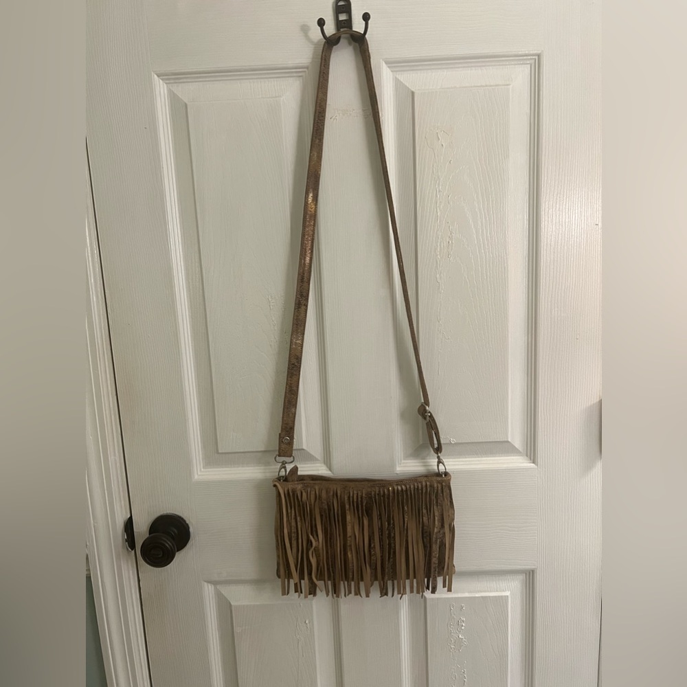 Cofi fringe clutch‎